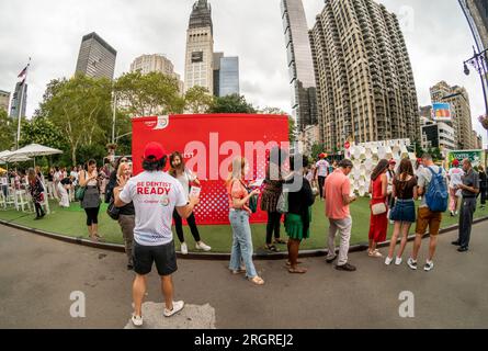 Brand activation for Colgate Total Plaque Pro-Release toothpaste in Flatiron Plaza in New York on Tuesday, August 8, 2023. The promotion for their plaque removing toothpaste revolves around ÒTotally HonestÓ referencing the lies people tell their dentists about their oral hygiene. Colgate is a brand of the Colgate-Palmolive Company. (© Richard B. Levine) Stock Photo