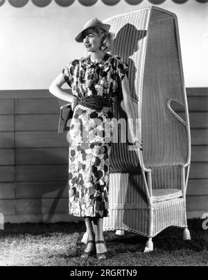 Hollywood, California:  1936 Actress Lucille Ball, popular RKO Radio Pictures player, models the latest in printed linen for spring fashions. Stock Photo