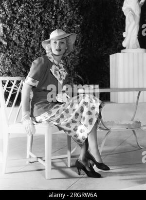Hollywood, California:  1936 Actress Lucille Ball, popular RKO Radio Pictures player, displays the latest in spring fashion. Stock Photo