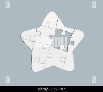 Missing piece puzzle, lacking part in whole concept. Stock Photo