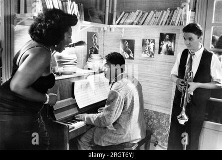Sandra Reaves-Phillips, Herbie Hancock (at piano), on-set of the Film, ''Round Midnight', Warner Bros., 1986 Stock Photo