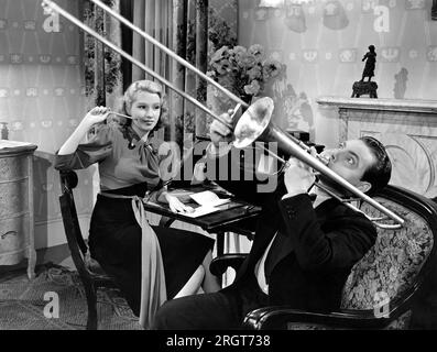 Kathryn Kane, Eddie Quillan, on-set of the Film, 'Swing, Sister, Swing', Universal Pictures, 1938 Stock Photo