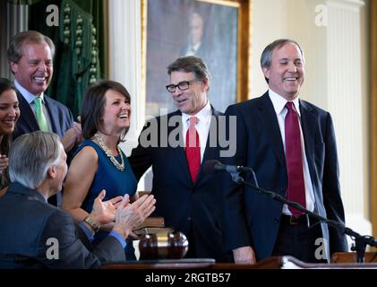 Austin, TX, USA. 5th Jan, 2015. Elected Texas Attorney General KEN PAXTON is sworn into office by Governor GREG ABBOTT on January 5, 2015. Paxton, now on leave from his post after 8 years in office, is facing impeachment charges in the Texas Senate in September for alleged abusing his office for personal gain. (Credit Image: © Bob Daemmrich/ZUMA Press Wire) EDITORIAL USAGE ONLY! Not for Commercial USAGE! Stock Photo