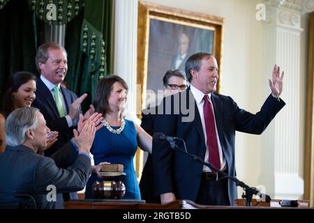 Austin, TX, USA. 5th Jan, 2015. Elected Texas Attorney General KEN PAXTON is sworn into office by Governor GREG ABBOTT on January 5, 2015. Paxton, now on leave from his post after 8 years in office, is facing impeachment charges in the Texas Senate in September for alleged abusing his office for personal gain. (Credit Image: © Bob Daemmrich/ZUMA Press Wire) EDITORIAL USAGE ONLY! Not for Commercial USAGE! Stock Photo