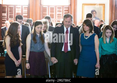 Austin, TX, USA. 5th Jan, 2015. Elected Texas Attorney General KEN PAXTON is sworn into office by Governor GREG ABBOTT on January 5, 2015. Paxton, now on leave from his post after 8 years in office, is facing impeachment charges in the Texas Senate in September for alleged abusing his office for personal gain. (Credit Image: © Bob Daemmrich/ZUMA Press Wire) EDITORIAL USAGE ONLY! Not for Commercial USAGE! Stock Photo