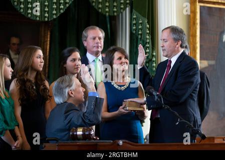 Elected Texas Attorney General KEN PAXTON is sworn into office by Governor GREG ABBOTT on January 5, 2015.  Paxton, now on leave from his post after 8 years in office, is facing impeachment charges in the Texas Senate in September for alleged abusing his office for personal gain. ©Bob Daemmrich Stock Photo