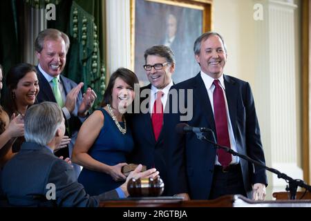 Elected Texas Attorney General KEN PAXTON is sworn into office by Governor GREG ABBOTT on January 5, 2015.  Paxton, now on leave from his post after 8 years in office, is facing impeachment charges in the Texas Senate in September for alleged abusing his office for personal gain. ©Bob Daemmrich Stock Photo