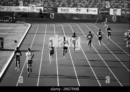 B. BYSTRICA, SLOVAKIA, JULY 20, 2023: Black and Wgite Track and Field photo. Men Sprint race Stock Photo