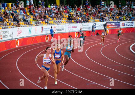 B. BYSTRICA, SLOVAKIA, JULY 20, 2023: Female Sprinters Engaged in 400m Race: Athletes Compete on the Track and Field Circuit for Worlds in Budapest an Stock Photo