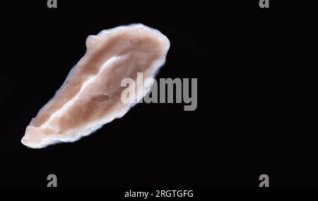 Drop of gel on black background Stock Photo