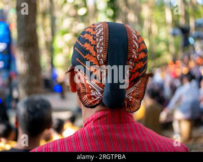 A colorful Blangkon, a traditional Javanese headgear worn by men and made of batik fabric. Stock Photo