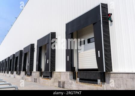 Warehouse gate for loading and unloading cargo in a distributed center Stock Photo
