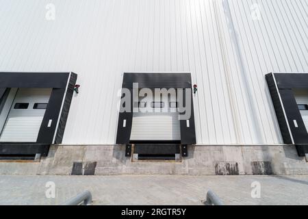 Warehouse gate for loading and unloading cargo in a distributed center Stock Photo