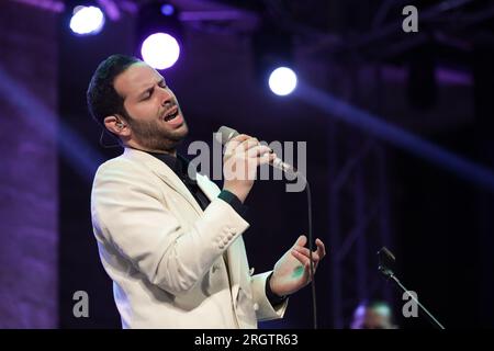 East Jerusalem, Israel. 10th Aug, 2023. The internationally known Palestinian artist, Omar Kamal, concluded the activities of the Jerusalem Festival 2023, at the Garden Theater of the National Conservatory of Music in Jerusalem on August 10, 2023. (Photo by Saeed Qaq/NurPhoto) Credit: NurPhoto SRL/Alamy Live News Stock Photo