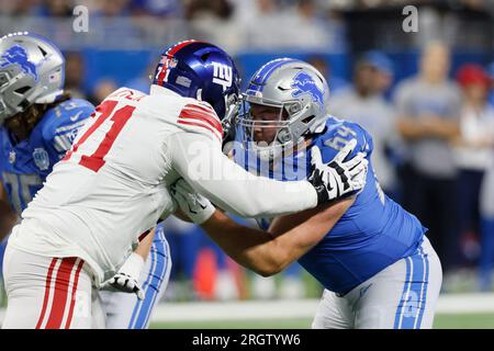 New York Giants defensive tackle Donovan Jeter (71) goes up against Detroit  Lions center Brad Cecil during the first half of an NFL preseason football  game, Friday, Aug. 11, 2023, in Detroit. (