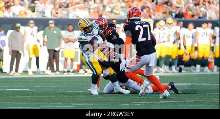 Miami. FL USA; Green Bay Packers running back AJ Dillon (28) is tripped up  while running with the ball short of the end zone during an NFL game again  Stock Photo - Alamy