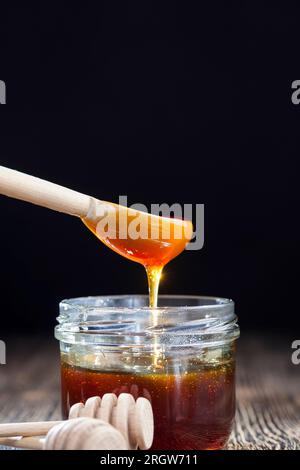 natural viscous honey, which is produced by honey bees, honey is packaged and used in food because it contains a large amount of carbohydrates and is Stock Photo