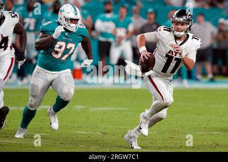 Atlanta Falcons quarterback Logan Woodside (11) runs with the ball