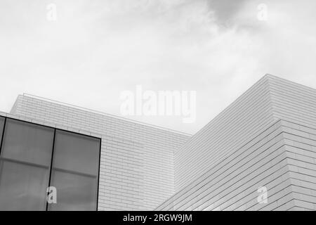 Black and white tone, Abstract architectural detail of modern white clean ceramic tiles with running bonds pattern facade. Stock Photo