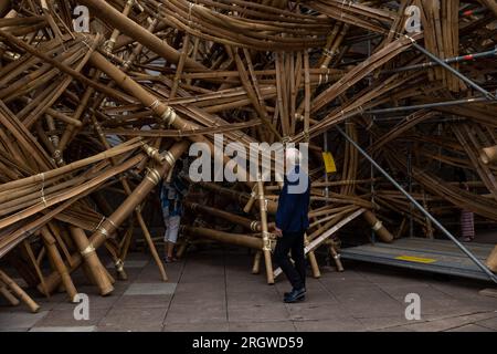 London, UK. 11th Aug, 2023. A man observes the giant art installation outside the Southbank Centre in London. Credit: SOPA Images Limited/Alamy Live News Stock Photo