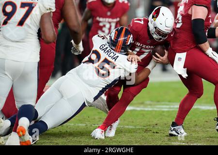 Denver Broncos defensive tackle Elijah Garcia celebrates after a sack  against the Arizona Cardinals during the second half of an NFL preseason  football game in Glendale, Ariz., Friday, Aug. 11, 2023. (AP