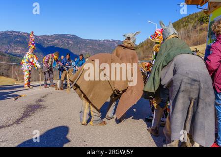 Valfloriana, Italy - February 26, 2022: Carnival participant reenacting local events, in the Valfloriana carnival, Trentino, Northern Italy Stock Photo