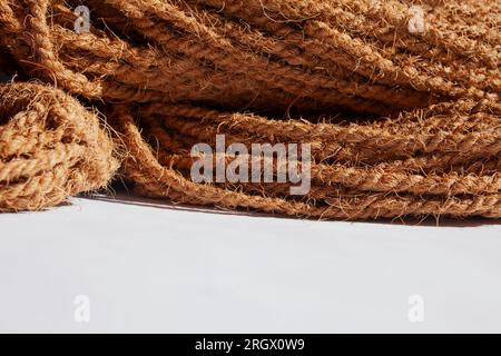 Coconut rope in a pile on white background Stock Photo - Alamy