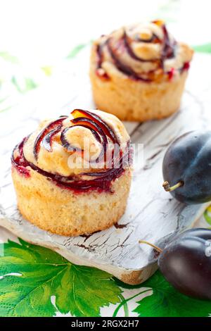 delicious muffins with plums Stock Photo