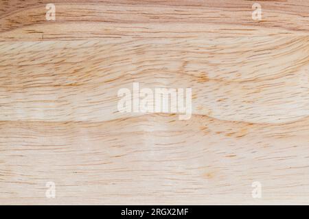 a board made of hevea wood, a light board with a hevea tree structure, from which a board of several boards is made Stock Photo