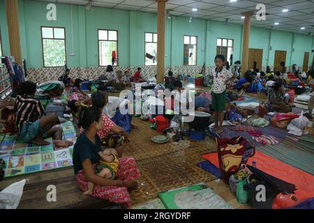 Bago, Myanmar. 12th Aug, 2023. Flood-affected people take shelter at a monastery in Bago, Myanmar, Aug. 12, 2023. Myanmar's Department of Disaster Management said on Friday that more than 45,000 people were currently in the flood shelters across the country due to floods triggered by surging river levels and intense rainfall in recent days.TO GO WITH 'Roundup: Over 45,000 displaced as floods, landslides hit Myanmar' Credit: Myo Kyaw Soe/Xinhua/Alamy Live News Stock Photo