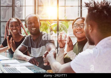 two businessmen making agreement in office Stock Photo