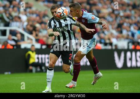 Newcastle on Saturday 12th August 2023. Newcastle United's Kieran Trippier is challenged by Aston Villa's Lucas Digne during the Premier League match between Newcastle United and Aston Villa at St. James's Park, Newcastle on Saturday 12th August 2023. (Photo: Michael Driver | MI News) Credit: MI News & Sport /Alamy Live News Stock Photo