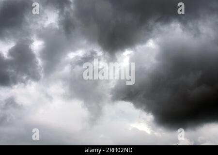 Thunderstorm stormy gloomy dark clouds. Dramatic ominous view Stock Photo