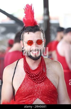 New Orleans, USA. 12th Aug, 2023. Event goers participate in the Red Dress Run activities at the Mandeville Shed in New Orleans, Louisiana on Saturday, August 12, 2023. (Photo by Peter G. Forest/Sipa USA) Credit: Sipa USA/Alamy Live News Stock Photo