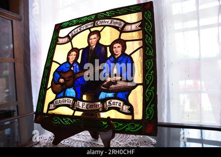A stained glass window portrait of country music pioneers The Carter Family at the Carter Family Museum in Maces Spring, Virginia.(See addit. info) Stock Photo