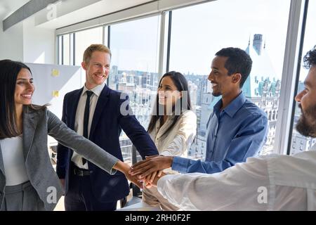 International business team people joining hands together in stack in office. Stock Photo