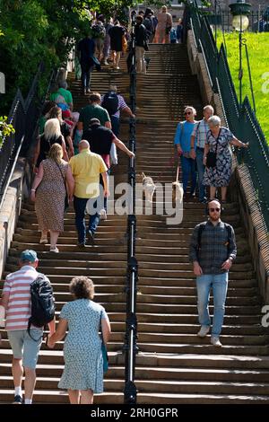 People climbing the refurbished Playfair Steps on The mound in Edinburgh, Scotland, UK Stock Photo