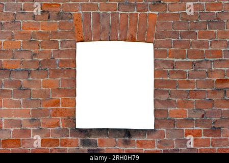 Antique brick window on red brick wall. Elements of architectural decoration with clipping path included. Red brick frame. Space for copying Stock Photo
