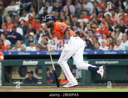 HOUSTON, TX - AUGUST 11: Houston Astros center fielder Mauricio Dubon (14)  is in the home dugout during the MLB game between the Los Angeles Angels  and Houston Astros on August 11