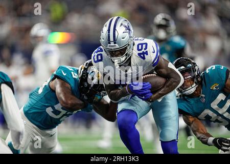 Dallas Cowboys wide receiver John Stephens Jr. (49) celebrates scoring a  touchdown during an NFL football