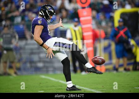 Baltimore Ravens punter Jordan Stout works out during mandatory