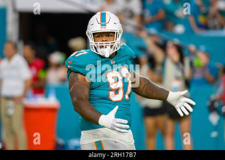 Miami Dolphins wide receiver Jaylen Waddle (17) goes flying as Buffalo Bills  defensive back Siran Neal (33) attempts a tackle, during the second half of  an NFL football game, Sunday, Sept. 19