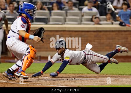 Atlanta, GA, USA. 04th July, 2019. Atlanta Braves shortstop Dansby Swanson  (left) kisses the head of infielder Ozzie Albies (right) after hitting an  eighth inning home run during a MLB game against