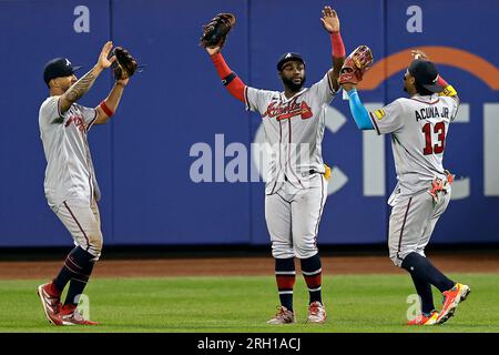 Atlanta Braves outfielders, from left, Eddie Rosario, Michael Harris II and  Ronald Acuna Jr. celebrate following a 12-5 victory against the Los Angeles  Angels at Truist Park on Wednesday, Aug. 2, 2023