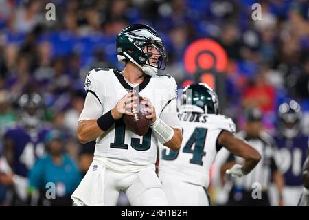 BALTIMORE, MD - AUGUST 12: Philadelphia Eagles quarterback Ian Book (19)  passes the ball during an N