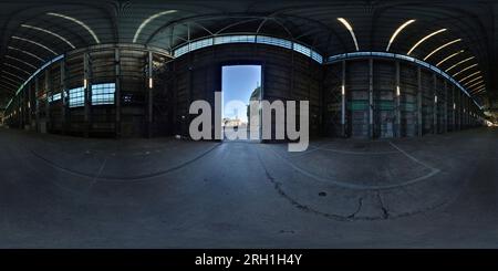 360 degree panoramic view of 360° Panorama, interior of the Turbine Shop, main hall, steel frame, corrugated iron skin, concrete floor; looking out towards Sutherland Dock