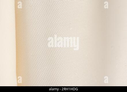 The curtain, beige or light brown blackout fabric, light-blocking fabric Stock Photo