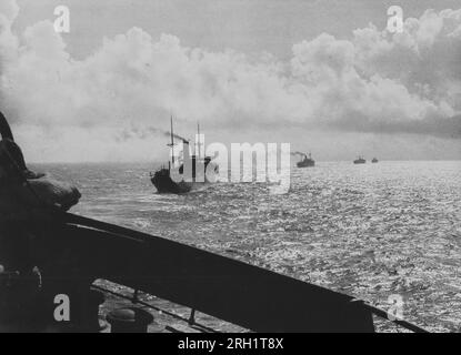 Invasion of the Philippines, December 1941 – May 1942. A convoy under the guard of the Imperial Japanese Navy advances towards Lingayen, circa December 1941. Stock Photo