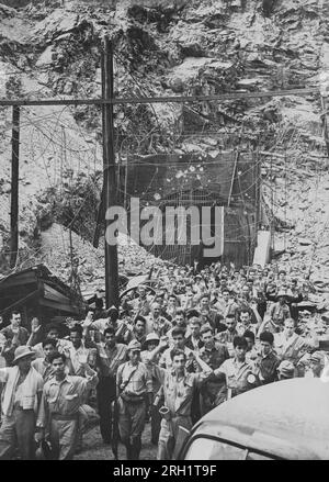 Invasion of the Philippines, December 1941 – May 1942. American and Filipino troops outside of the Malinta Tunnel surrender en masse to the invading Imperial Japanese Army on the fortress island of the Corregidor, May 1942. Stock Photo