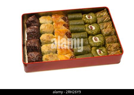 Turkish pistachio baklava isolated on a white background. A variety of turkish sweet baklava. Walnut baklava. Stock Photo